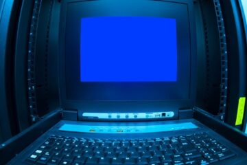 Close-up of a blue screen error shown on a data center control terminal.