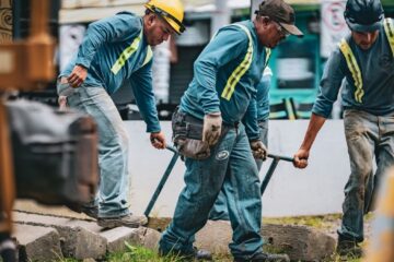Team of construction workers collaborating on a project in San José, Costa Rica.